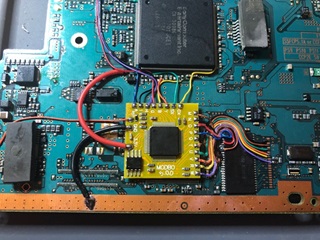 Picture of a Playstation 2 Mod installed on the PS2's motherboard.